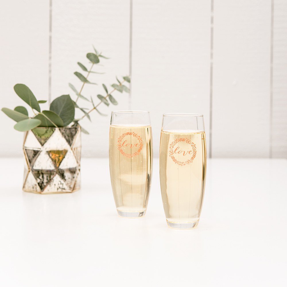 https://www.foreverweddingfavors.com/cdn/shop/products/personalized-stemless-toasting-champagne-flute-wedding-favor-gift-430047_1000x.jpg?v=1686403611